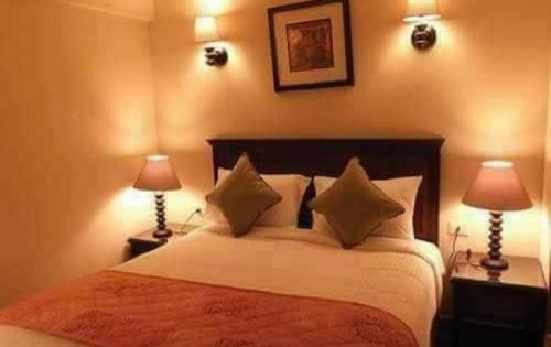 إحدى-الغرف-في-منتجع-فندق-بورتو-ساوث-بيتش-العين-السخنة-من-شركة-الحرية-للحلول-التسويقية-والعقارية